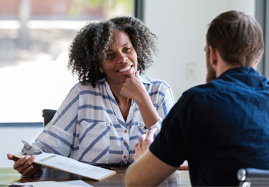 Black man in counseling session with doctor