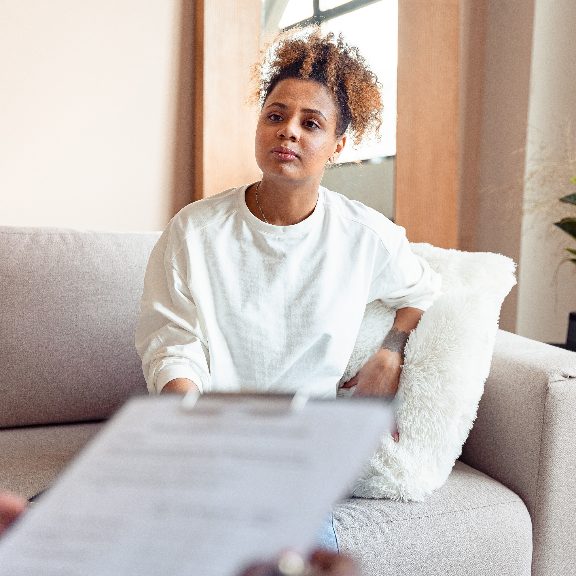 Black man in counseling session with doctor