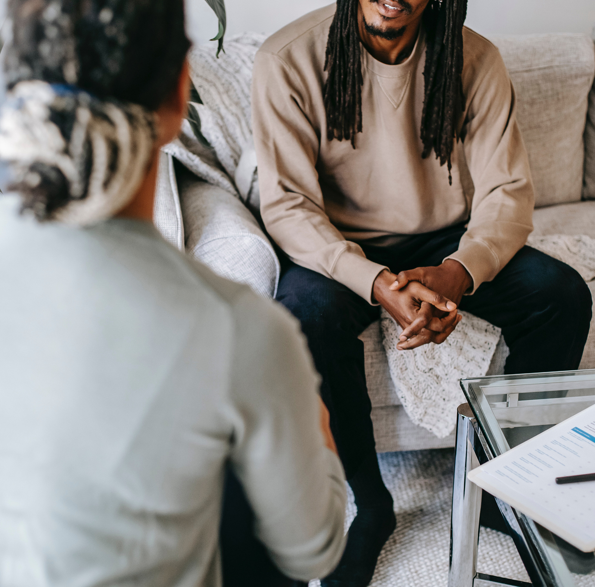 Black man in counseling session with doctor